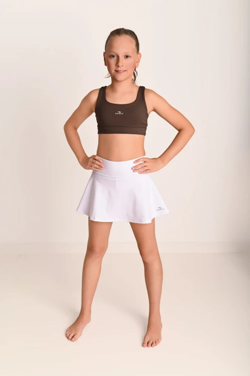 Spódniczka dziewczęca z getrami i siateczką ActiveMesh biała - modelka stoi przodem