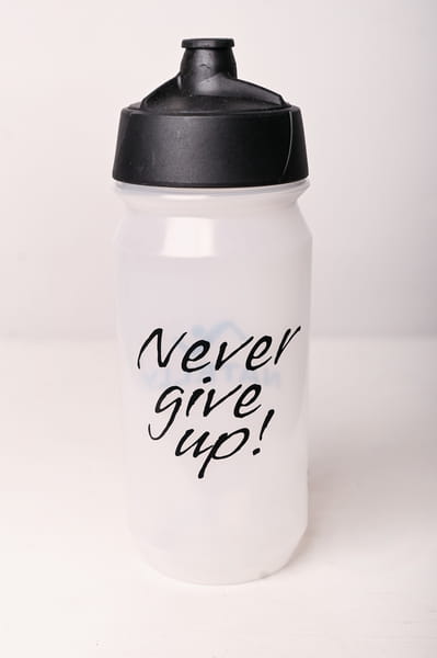 Bidon sportowy NATELLY BIO by Tacx - biały z napisem Never Give Up